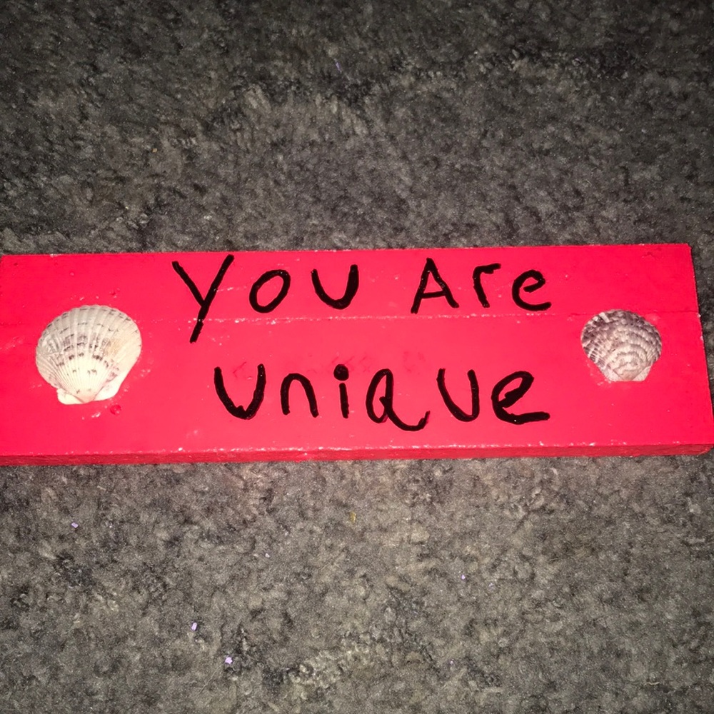 Pink positive sign